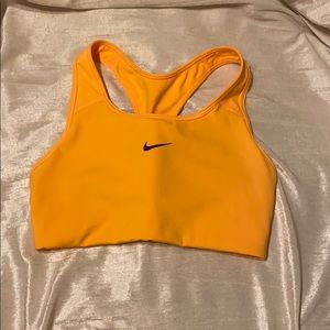 Orange Nike sports bra